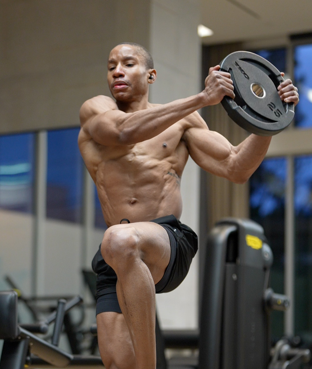 Coach is working out in the gym.